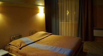 Фото номера Номер Делюкс (на 2 взрослых и 1 ребенка) Гостевой дом Melnitsa Inn г. Мурманск 2