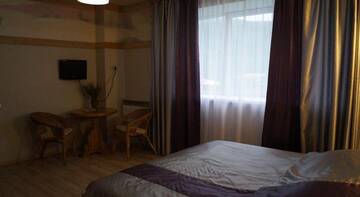 Фото номера Двухместный номер Делюкс с 1 кроватью и ванной Гостевой дом Melnitsa Inn г. Мурманск 5