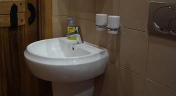 Фото номера Номер Делюкс (на 2 взрослых и 1 ребенка) Гостевой дом Melnitsa Inn г. Мурманск 5