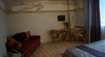 Фото номера Двухместный номер Делюкс с 1 кроватью и ванной Гостевой дом Melnitsa Inn г. Мурманск 6